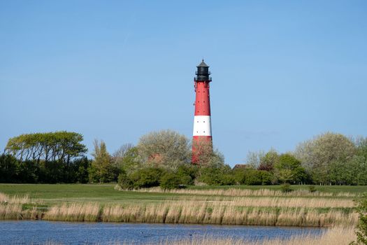 Panoramic image of Pellworm lighthouse against sky, North Frisia, Germany 