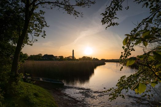 Panoramic image of Pellworm lighthouse against sky, North Frisia, Germany 