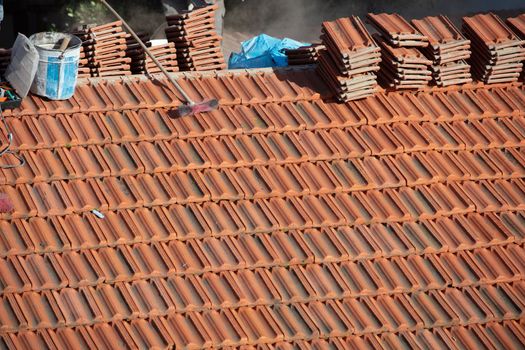 repairing the roof of a home