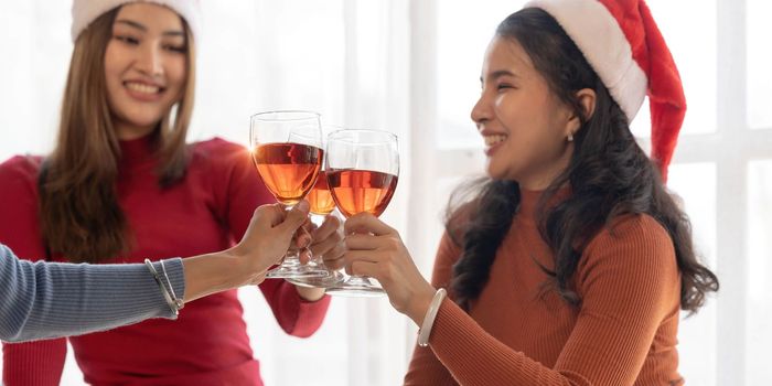 Group of young cute Asian girl gang best friends having party at office girl friends having fun and celebrating Girls drinking beer alco