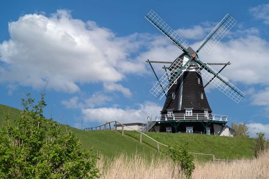 Panoramic image of the windmill of Pellworm against blue sky, North Frisia, Germany