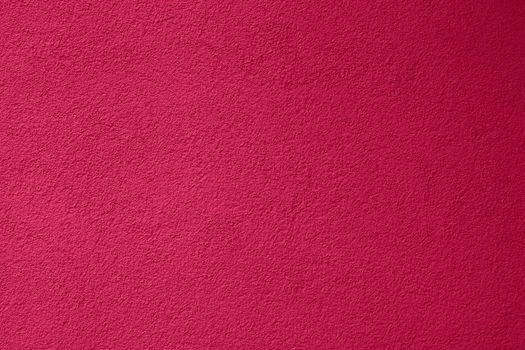 Viva Magenta toned colour grunge decorative navy dark wall background. Art rough stylized texture banner trendy color 2023. Grunge Viva Magenta color texture
