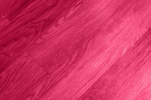 Viva Magenta color wood texture monochrome background. Wood texture with natural pattern. Color of the year 2023. High quality photo