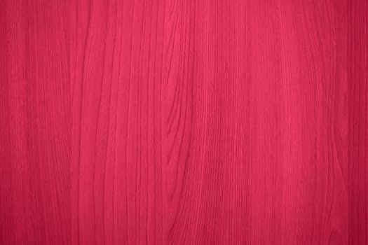 Viva Magenta color wood texture monochrome background. Wood texture with natural pattern. Color of the year 2023. High quality photo