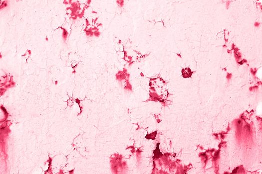 Viva Magenta wall with dirty scratches and metal stains. Metal rust monochrome background. High quality photo