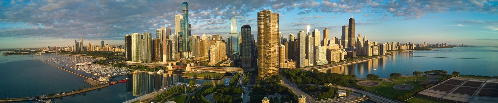 Image of Wide panorama of Chicago city skyline from aerial view at Navy Pier during sunrise