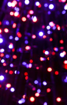 Fragment of holiday illumination made of electric lights.