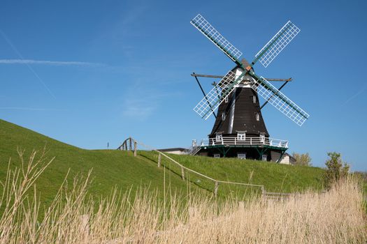 Panoramic image of the windmill of Pellworm against blue sky, North Frisia, Germany