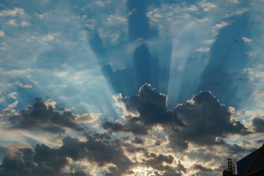 Stormy sky with dramatic clouds from an approaching thunderstorm at sunset Dramatic sky with cirrus and cumulus clouds under the blue sky before rain. Idyllic summer scene. Panoramic view. Recreation, ecotourism, nature in Italy, High quality photo