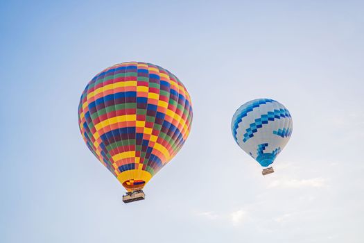 Beautiful hot air balloons over blue sky.