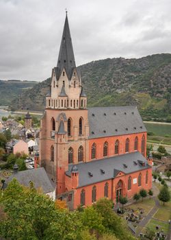 Abbey church of Oberwesel against cloudy sky, Rhine Valley, Germany