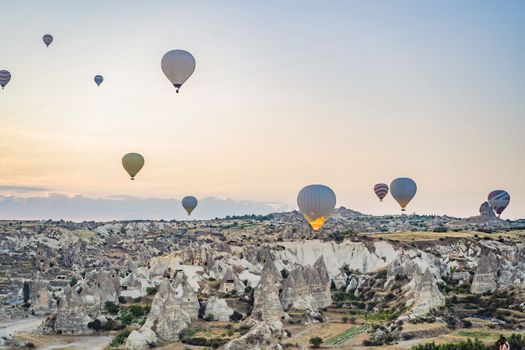 Colorful hot air balloon flying over Cappadocia, Turkey.