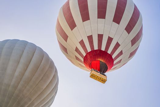 Beautiful hot air balloons over blue sky.