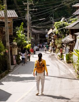 Asian women visit Mae Kampong Pang Klang village in Chiang Mai Thailand, is an old village in Mae Kampong village in the mountains