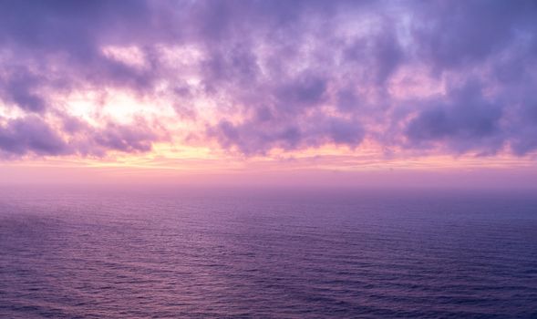 cloudy sunset view over the ocean beautiful background. High quality photo