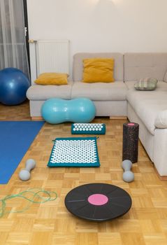 living room with light sport and yoga equipment. High quality photo