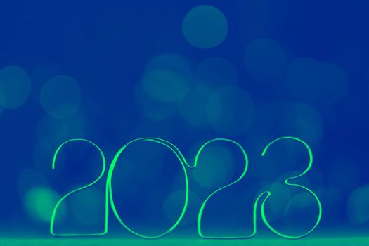 Happy New Year 2023. Beautiful web banner or billboard template with ecological green new year number 2023 on blue background with copy space for text High quality photo