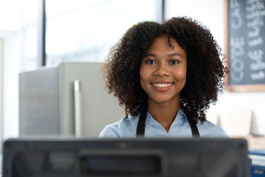 Successful Small Business Startup Small business owner SME Beauty Girl standing in front of a coffee shop with her arms crossed. Picture of an Asian female barista cafe owner...