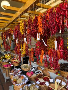 colorful red and orange peppers at the market mobile photo. High quality photo