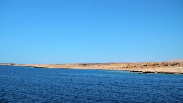 summer, sea, beautiful seascape. Mountains and the sea. The combination of the desert and the sea. High quality photo