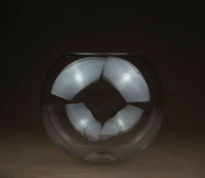transparent glass ball on black background. High quality photo