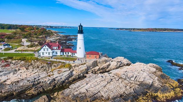 Image of Rocky coastline aerial view of stunning Portland Head Light lighthouse in Maine