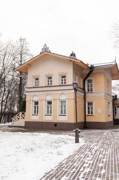 An old beautiful mansion with a wooden veranda, built in the 19th century. A big old house with a garden in Cherepovets, Russia. The building houses a museum 