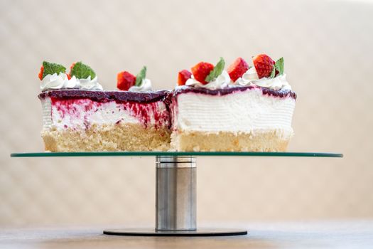 fruit cake with marmalade and whipped cream.