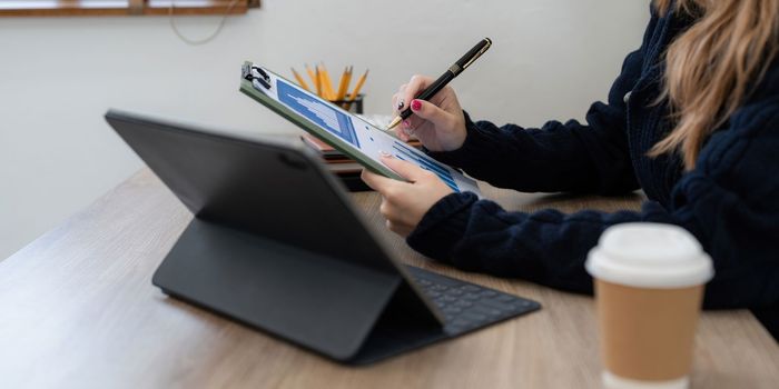 Asian woman working with laptop at home. work from home concept.