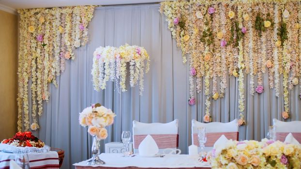 wedding decoration, decoration of the wedding ceremony, wedding decorations made from real flowers. wedding flower arrangements. High quality photo