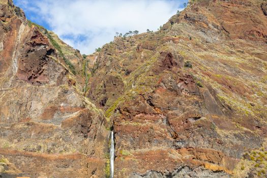 colorful rock cut beautiful mountains and waterfall. High quality photo