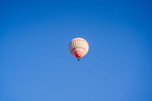 Beautiful hot air balloons over blue sky.