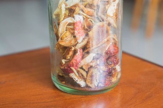 Jar of dried fruits that worms eat.