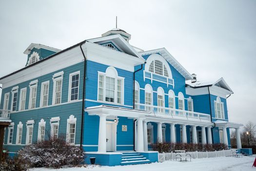 An old beautiful mansion with a wooden veranda, built in the 19th century. A big old house with a garden in Cherepovets, Russia. The building houses a museum 