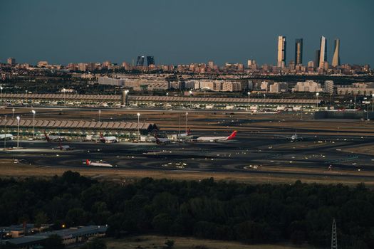 Madrid barajas airport and city skyline in the background.