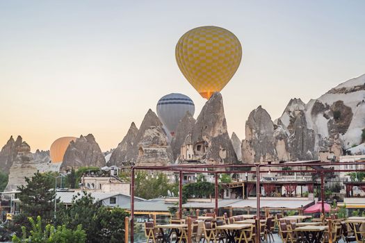 Colorful hot air balloon flying over Cappadocia, Turkey.