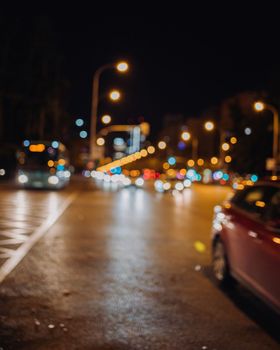 Blurred on purpose. Urban traffic lights at night. City life concept in Madrid , spain.