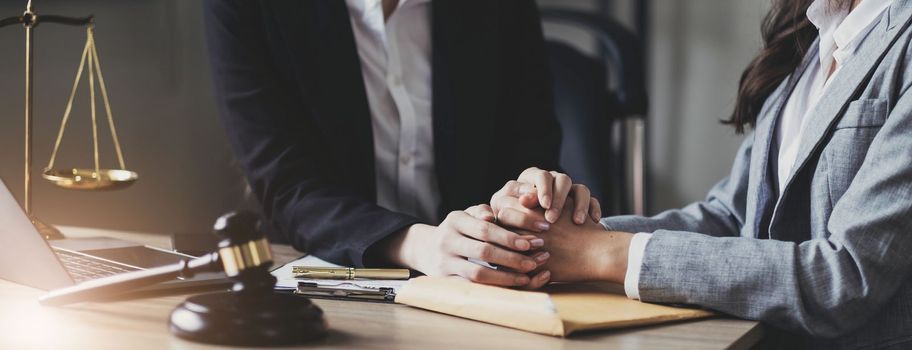 Justice and attorney concept. Lawyer meeting and consoling solution to his client provide legal advice and trust commitment strain serious for problem..