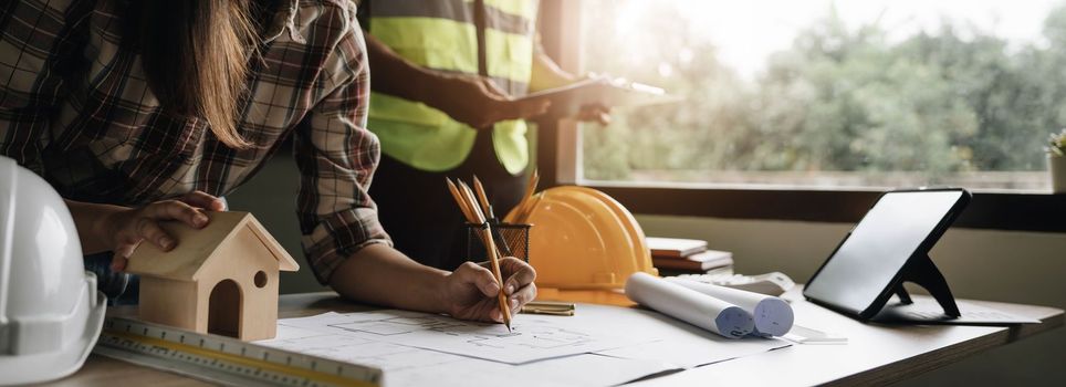 Engineer Teamwork Meeting, Drawing working on blueprint meeting for project working with partner on model building and engineering tools in working site, Construction and structure concept...