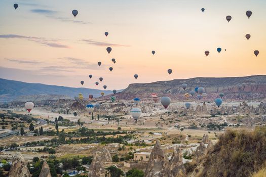 Colorful hot air balloon flying over Cappadocia, Turkey.