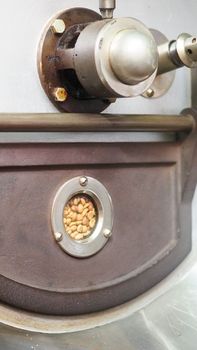 vintage old coffee roaster cooking coffee beans