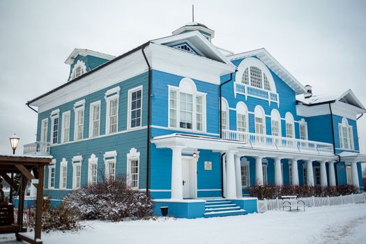 An old beautiful mansion with a wooden veranda, built in the 19th century. A big old house with a garden in Cherepovets, Russia. The building houses a museum 