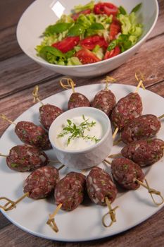 Recipe of kefta, beef skewer, Traditional homemade, with Greek yoghurt sauce, garlic, savory, Arabic and Libanese food, High quality photo