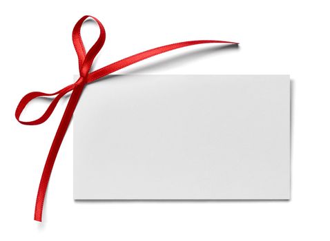close up of a note card with ribbon bow on white background
