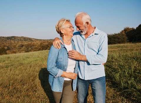 Happy active senior couple outdoors