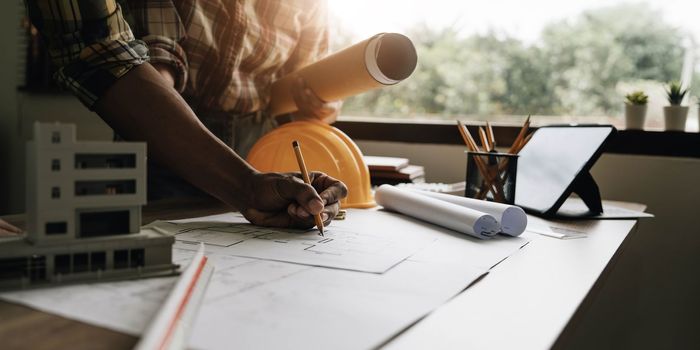 Engineer Teamwork Meeting, Drawing working on blueprint meeting for project working with partner on model building and engineering tools in working site, Construction and structure concept...