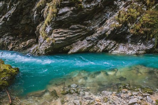 Blue water in a mountain river in Slovenia.