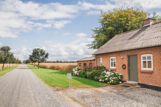 Beautiful farmhouse near the field.