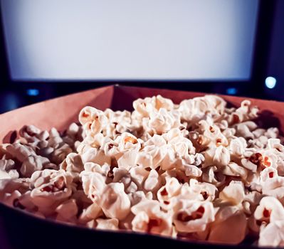 Cinema and entertainment, popcorn box in the movie theatre for tv show streaming service and film industry production branding