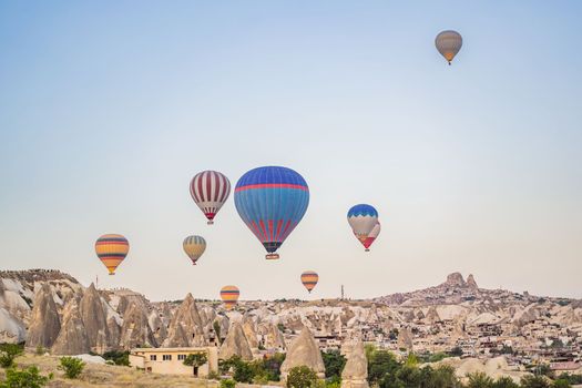 Colorful hot air balloon flying over Cappadocia, Turkey.